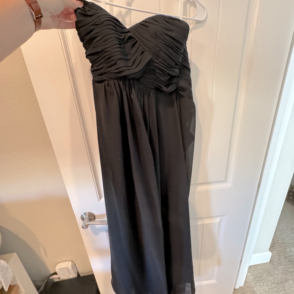 Strapless black wedding guest or bridesmaid dress